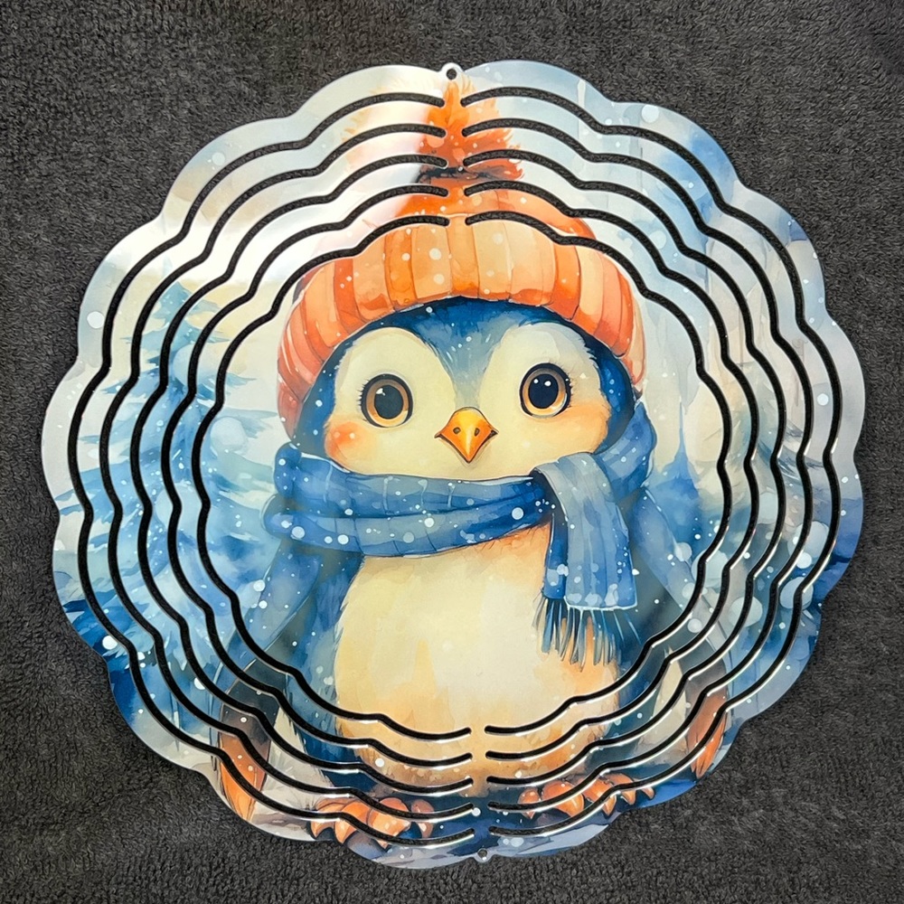 Super cute penguin bundled up ready for the snow fall wind spinner!